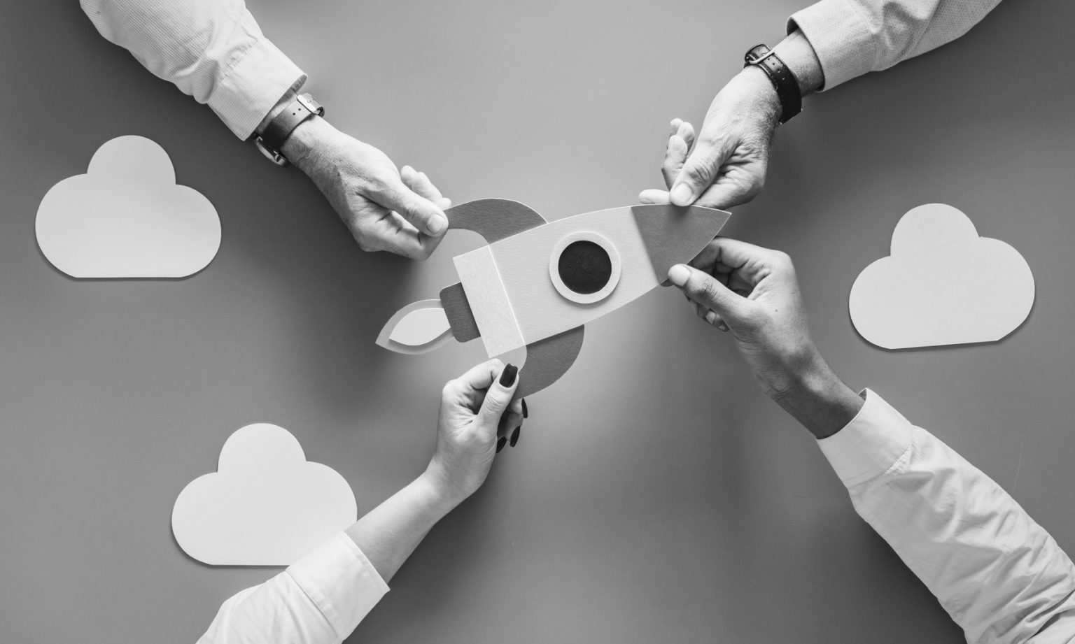 business-people-with-startup-rocket